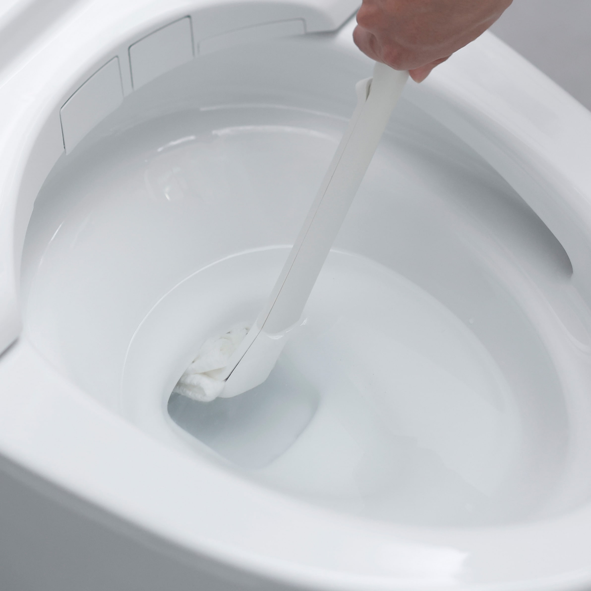 シートを挟むトイレクリーナー